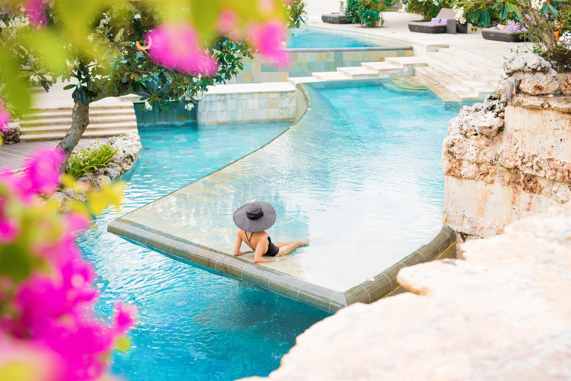 Resort pool and palms for premium Crays hospitality spaces